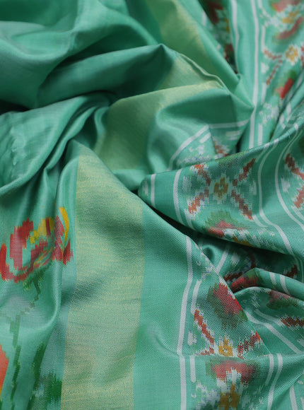 Teal Green Ikkat Silk Saree