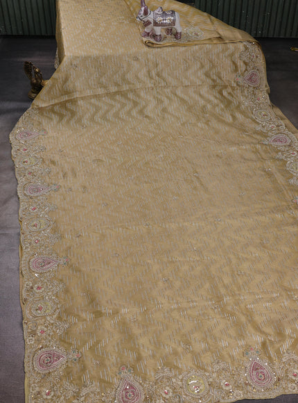 Pastel Yellow Tissue Embroidery Silk Saree