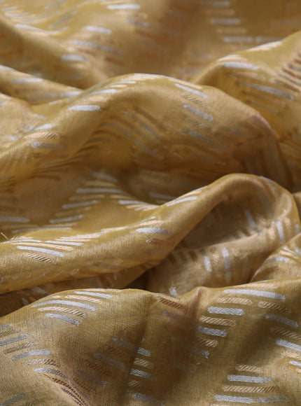 Pastel Yellow Tissue Embroidery Silk Saree