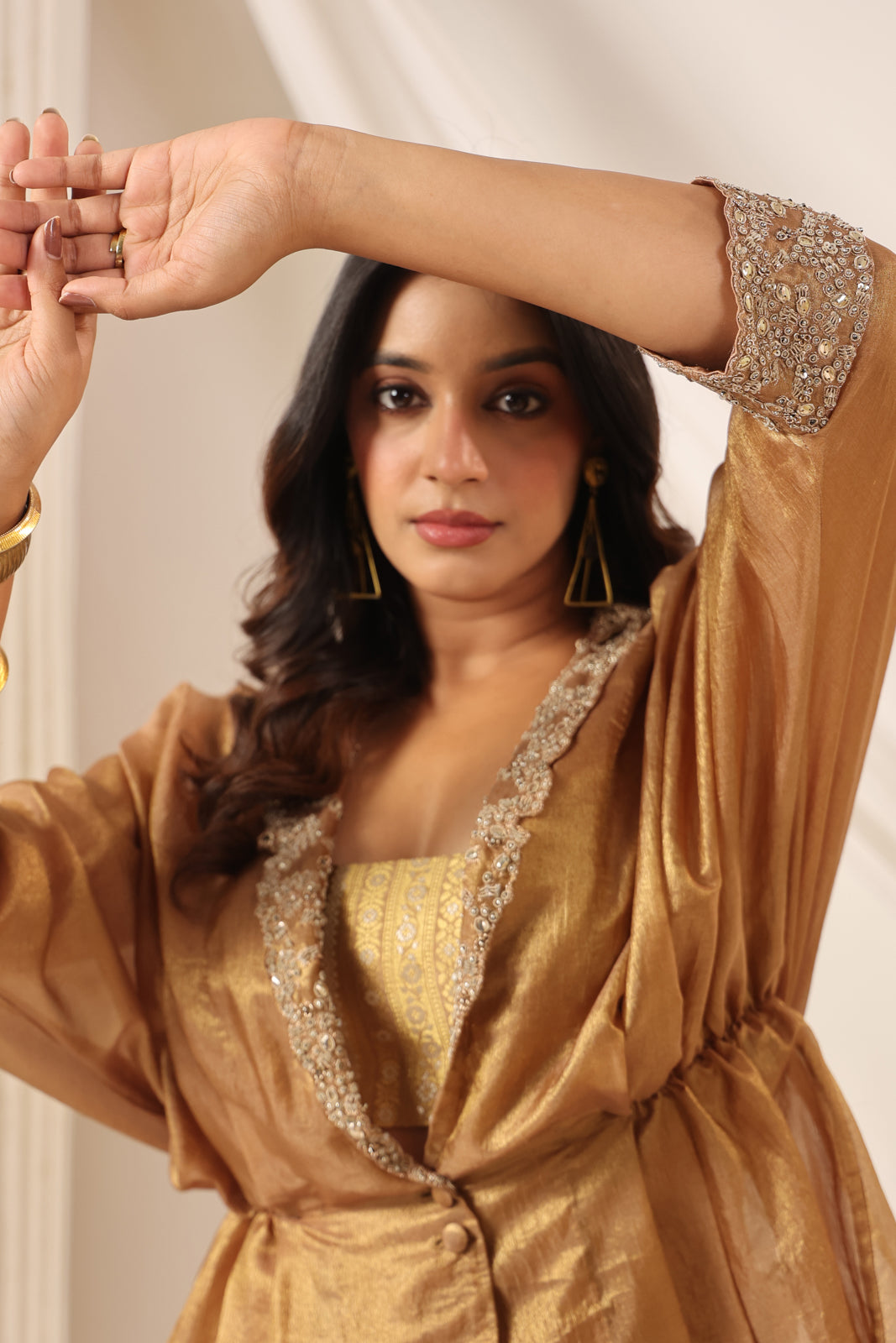 Golden Banarasi Silk Croptop With Flared Pant And Embroided Jacket