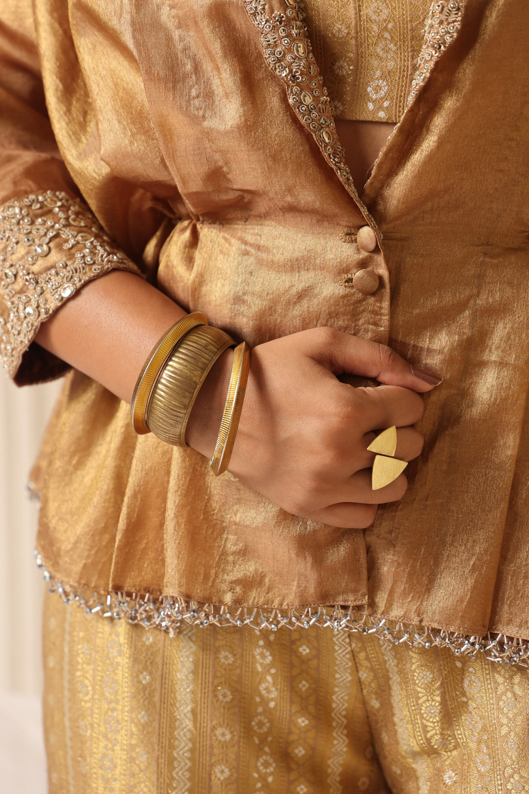 Golden Banarasi Silk Croptop With Flared Pant And Embroided Jacket