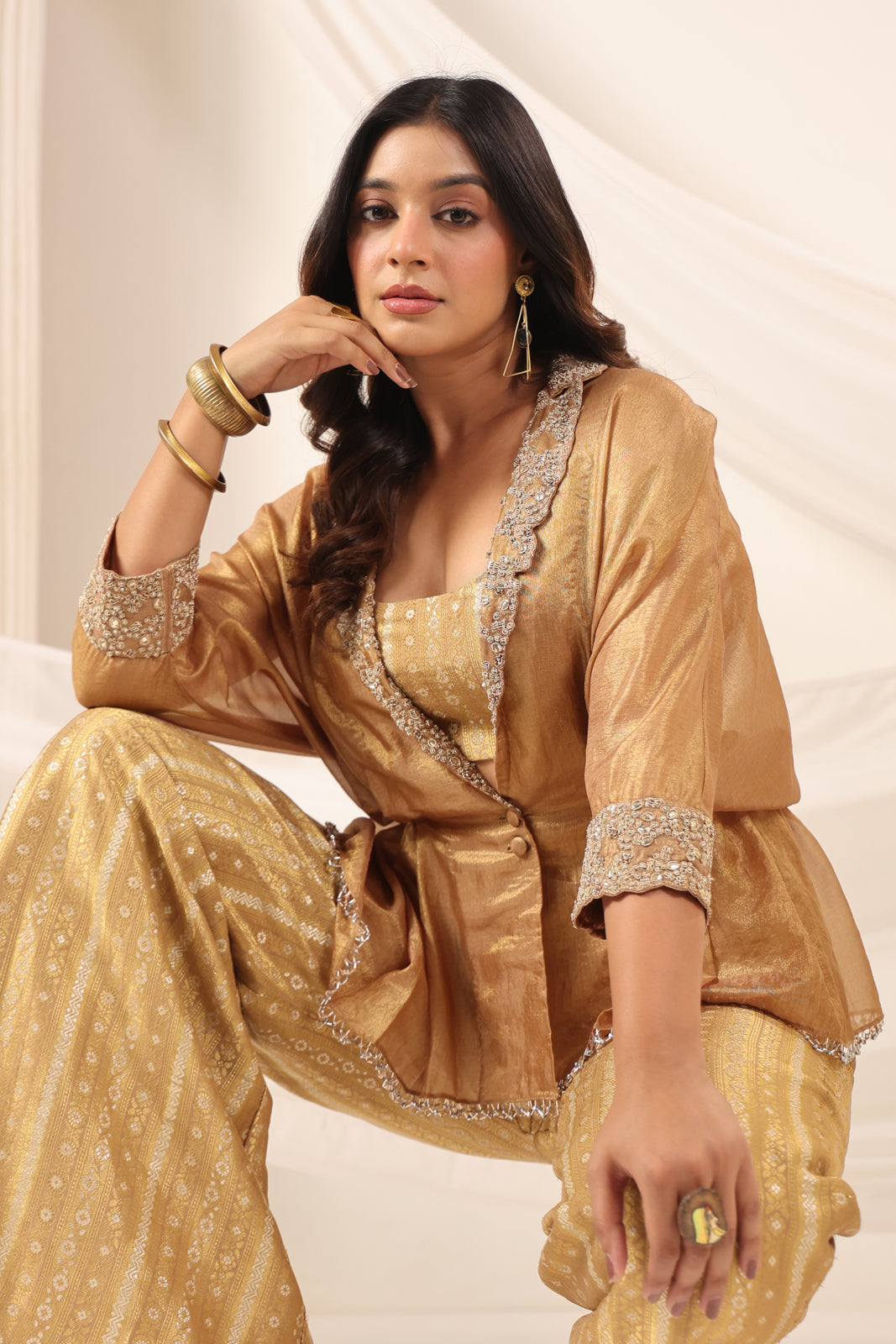 Golden Banarasi Silk Croptop With Flared Pant And Embroided Jacket