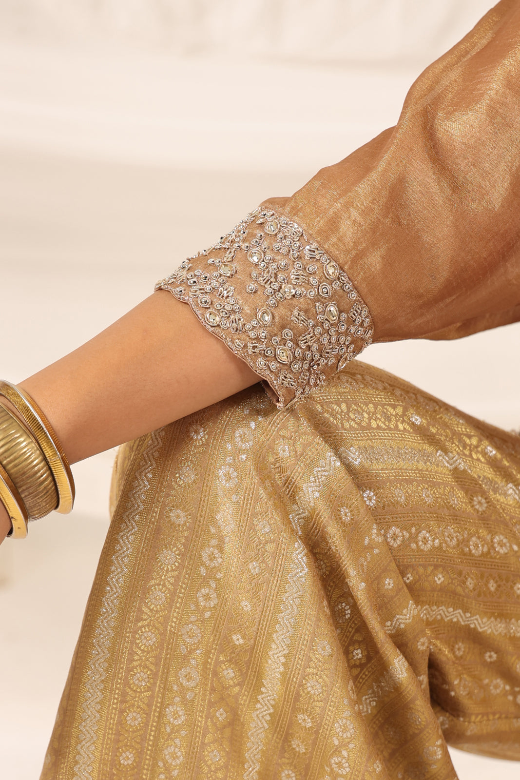 Golden Banarasi Silk Croptop With Flared Pant And Embroided Jacket