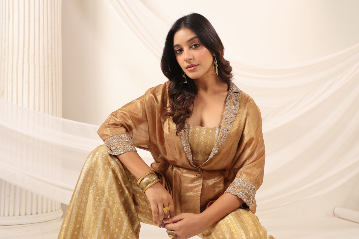 Golden Banarasi Silk Croptop With Flared Pant And Embroided Jacket