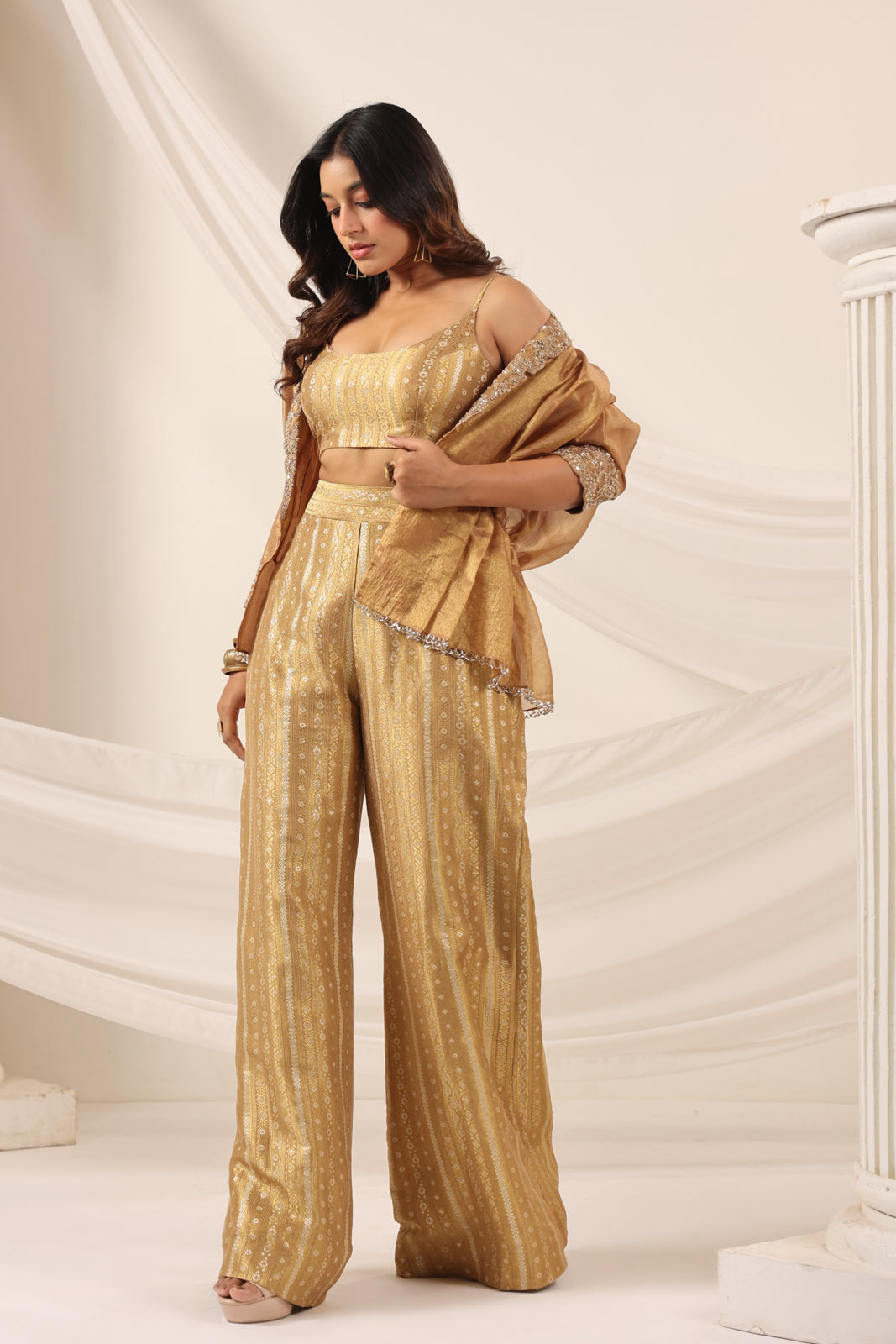Golden Banarasi Silk Croptop With Flared Pant And Embroided Jacket