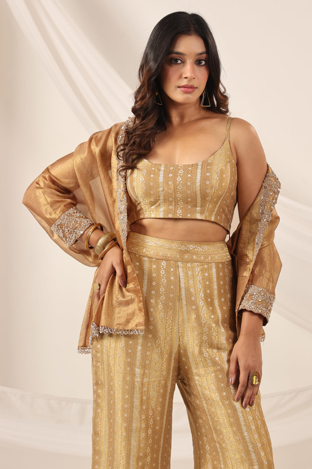 Golden Banarasi Silk Croptop With Flared Pant And Embroided Jacket