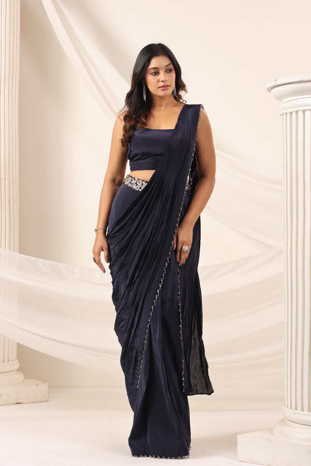 Navy Blue Crepe Pre-Draped Saree With Croptop And Heavy Sequined Net Jacket