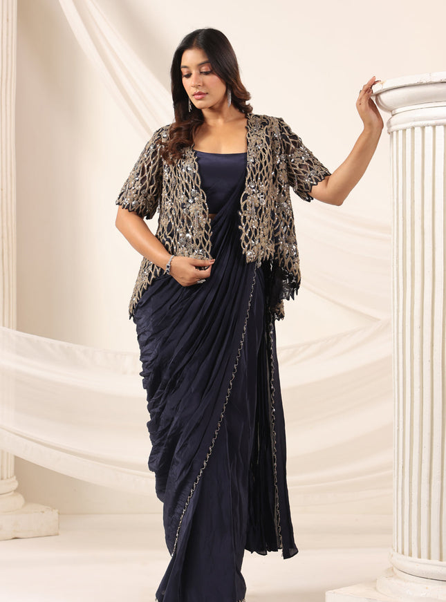 Navy Blue Crepe Pre-Draped Saree With Croptop And Heavy Sequined Net Jacket