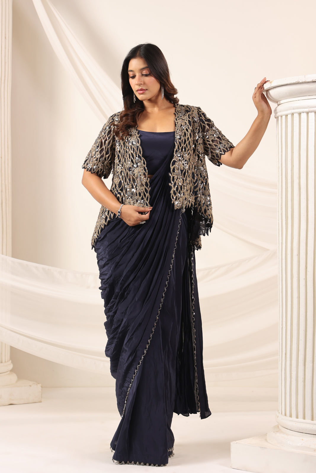 Navy Blue Crepe Pre-Draped Saree With Croptop And Heavy Sequined Net Jacket
