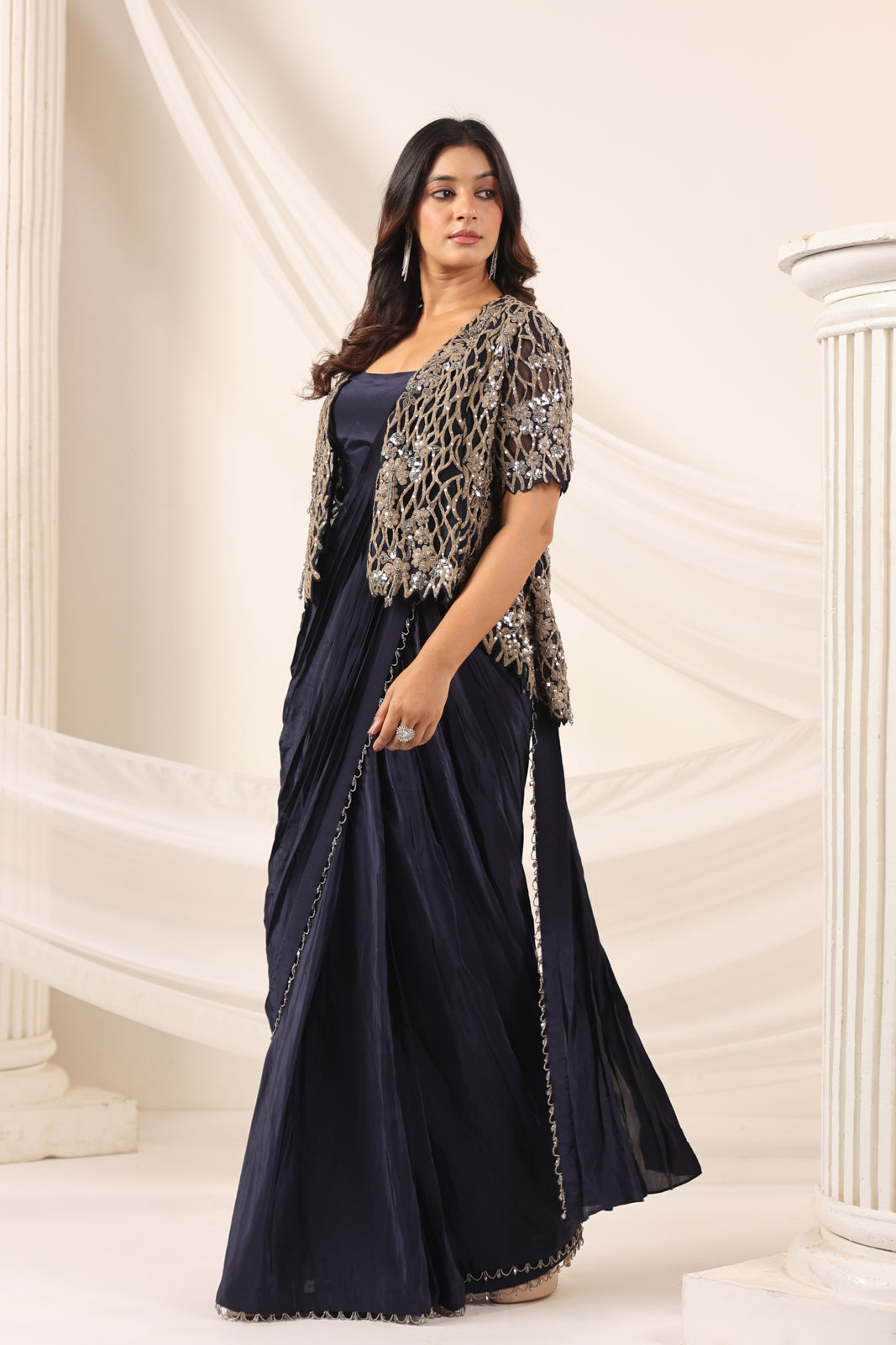 Navy Blue Crepe Pre-Draped Saree With Croptop And Heavy Sequined Net Jacket