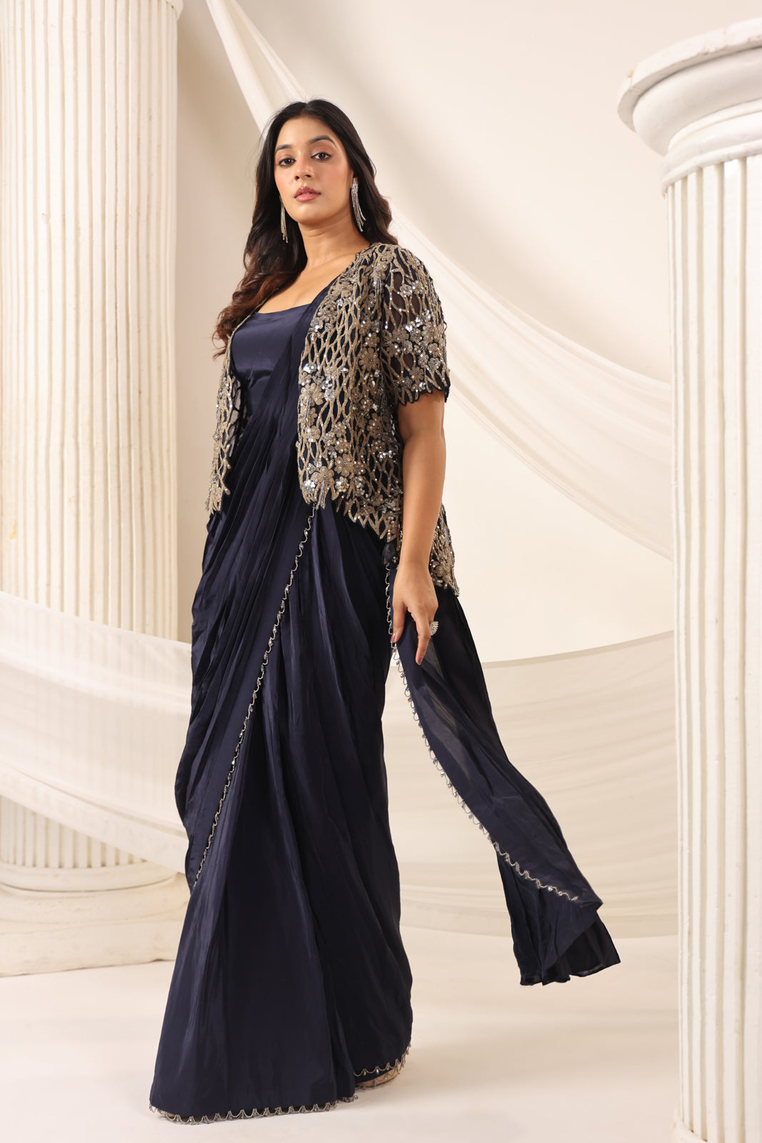 Navy Blue Crepe Pre-Draped Saree With Croptop And Heavy Sequined Net Jacket