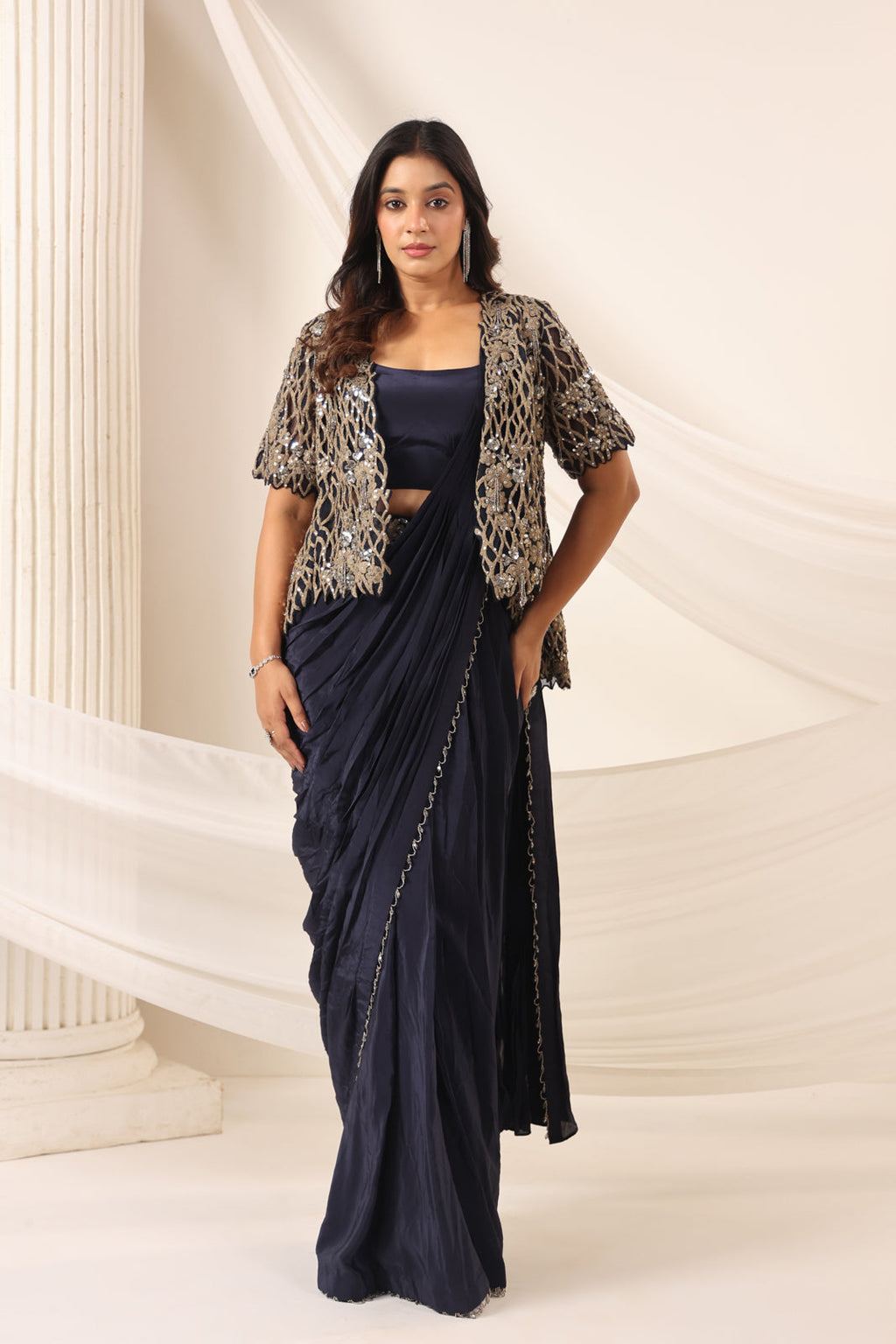 Navy Blue Crepe Pre-Draped Saree With Croptop And Heavy Sequined Net Jacket