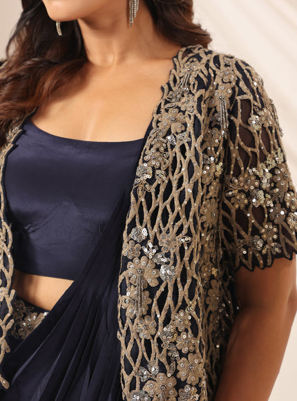 Navy Blue Crepe Pre-Draped Saree With Croptop And Heavy Sequined Net Jacket
