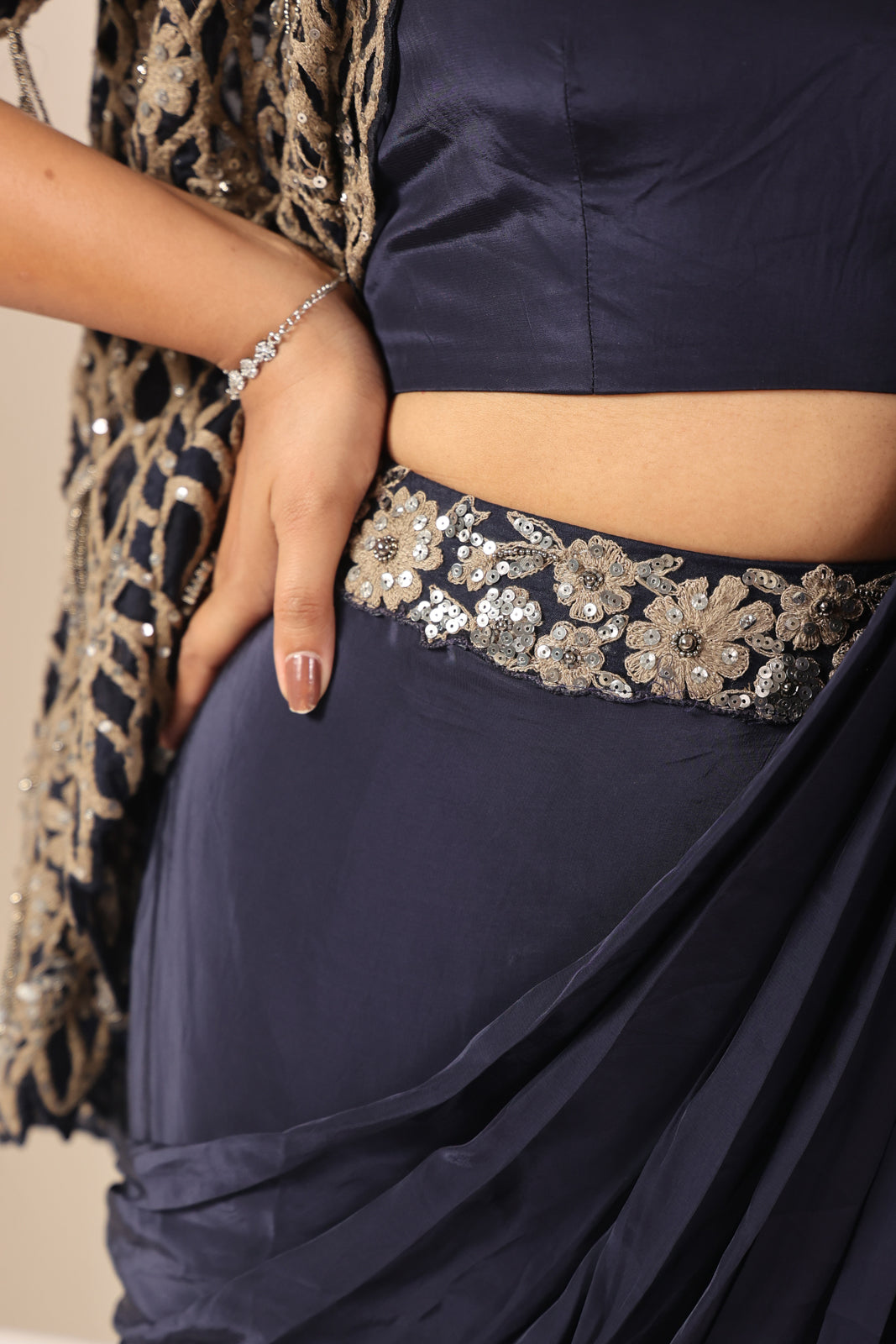Navy Blue Crepe Pre-Draped Saree With Croptop And Heavy Sequined Net Jacket