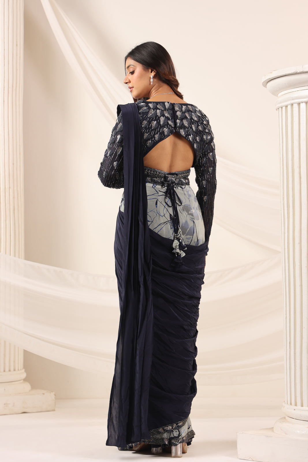 Navy Blue Crepe Pre-Draped Saree With Embroided Blouse And Partly Prints