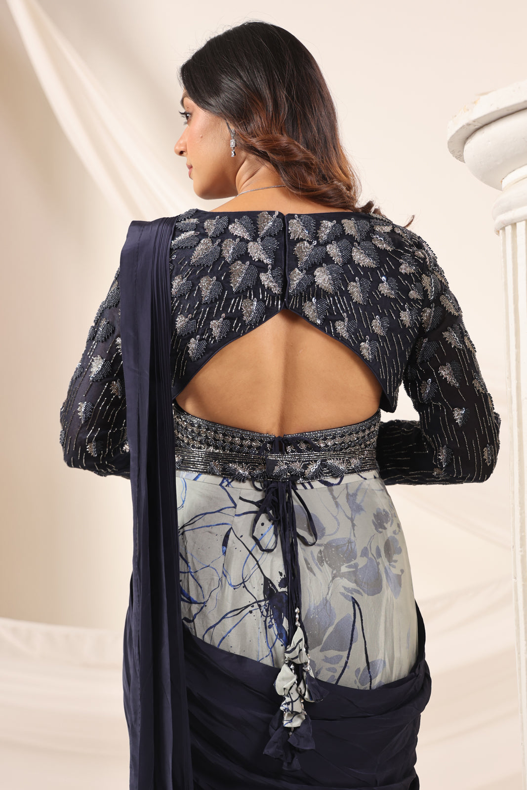 Navy Blue Crepe Pre-Draped Saree With Embroided Blouse And Partly Prints