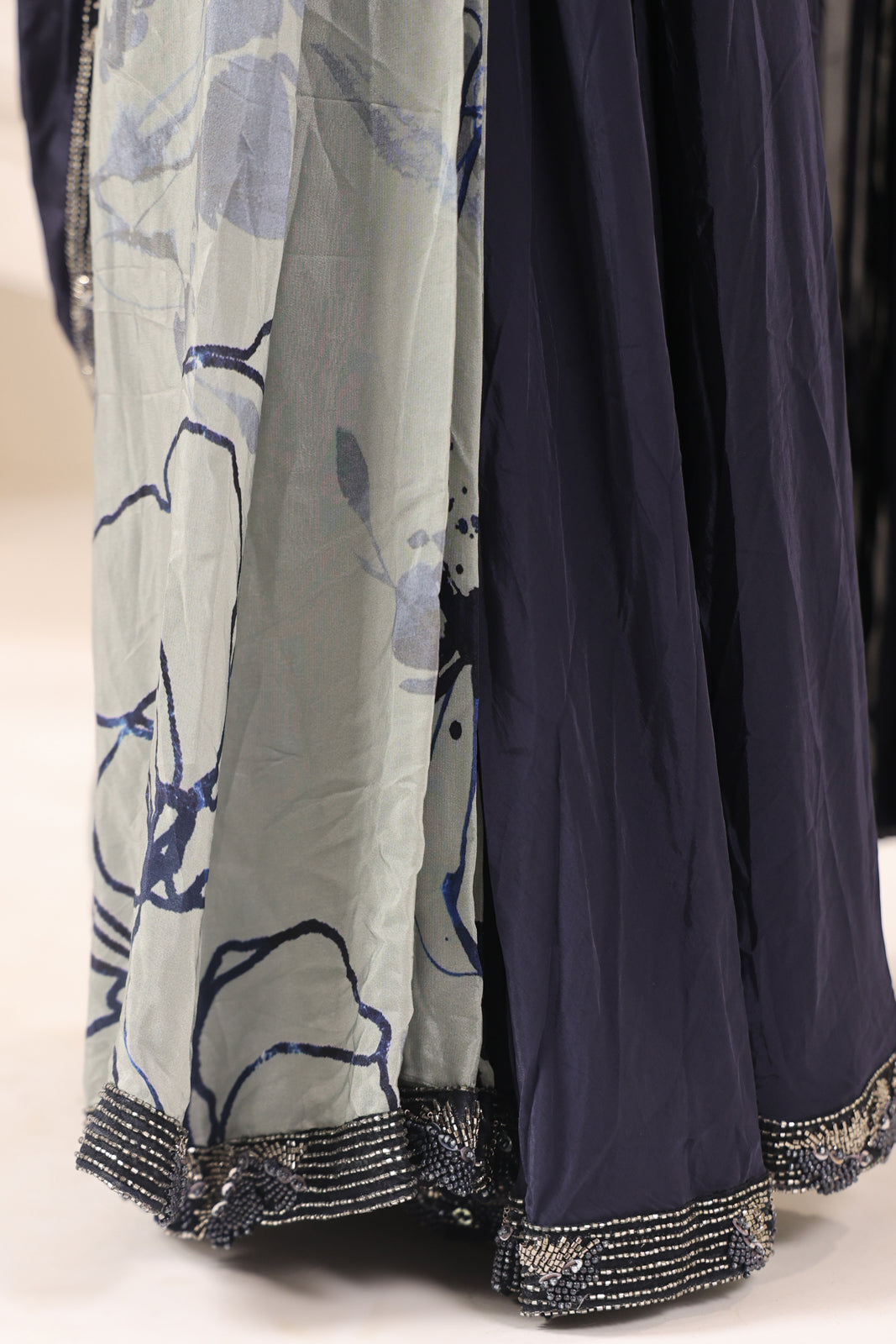Navy Blue Crepe Pre-Draped Saree With Embroided Blouse And Partly Prints