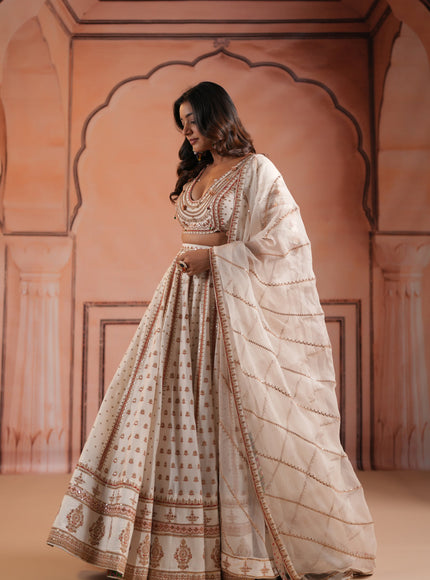 Off White Raw Silk Crop Top Lehenga Set With Allover Sequin Work And Embroidery