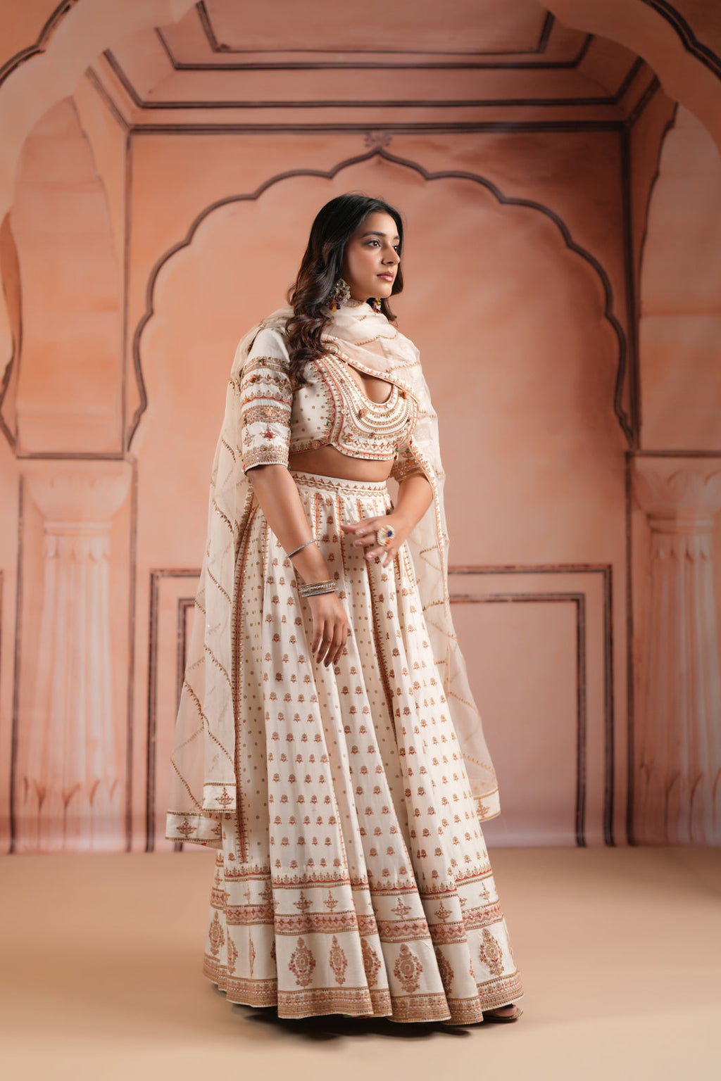 Off White Raw Silk Crop Top Lehenga Set With Allover Sequin Work And Embroidery