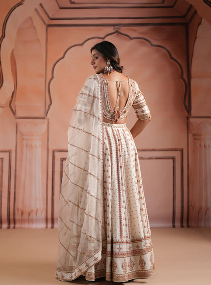 Off White Raw Silk Crop Top Lehenga Set With Allover Sequin Work And Embroidery