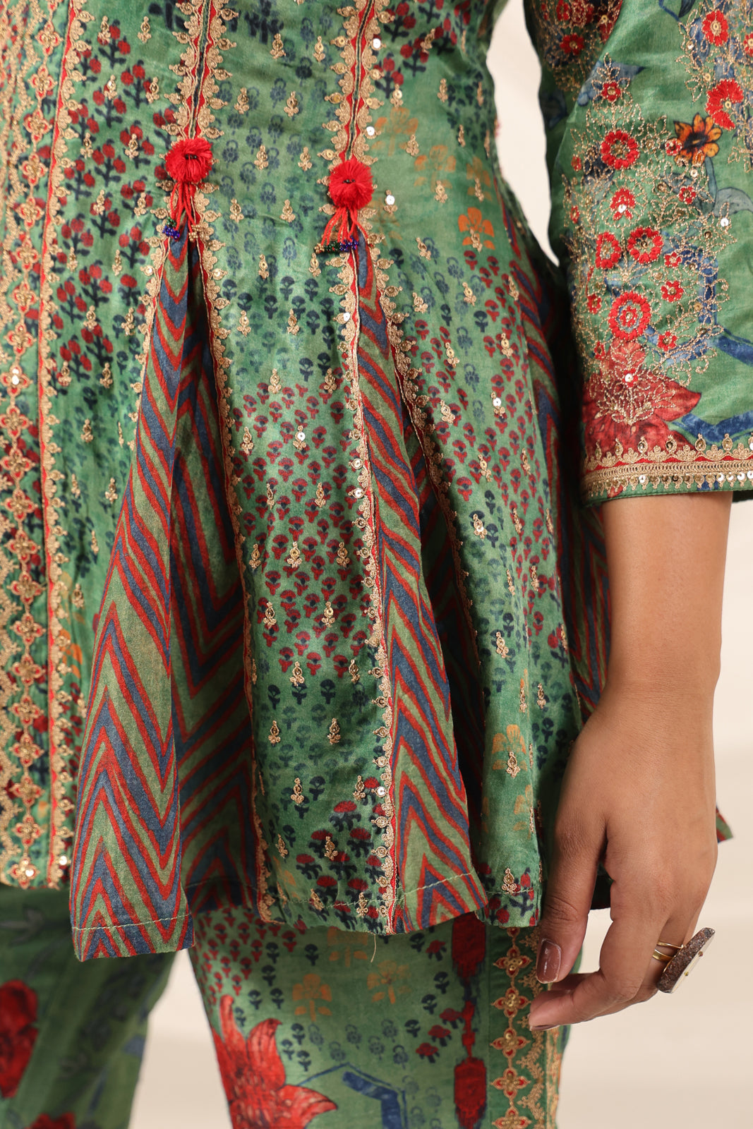Green Satin Crepe Peplum Set With Intricate Prints & Embroidery- Wide Paired Palazzo Pant