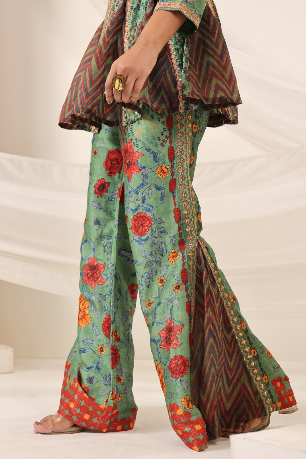 Green Satin Crepe Peplum Set With Intricate Prints & Embroidery- Wide Paired Palazzo Pant