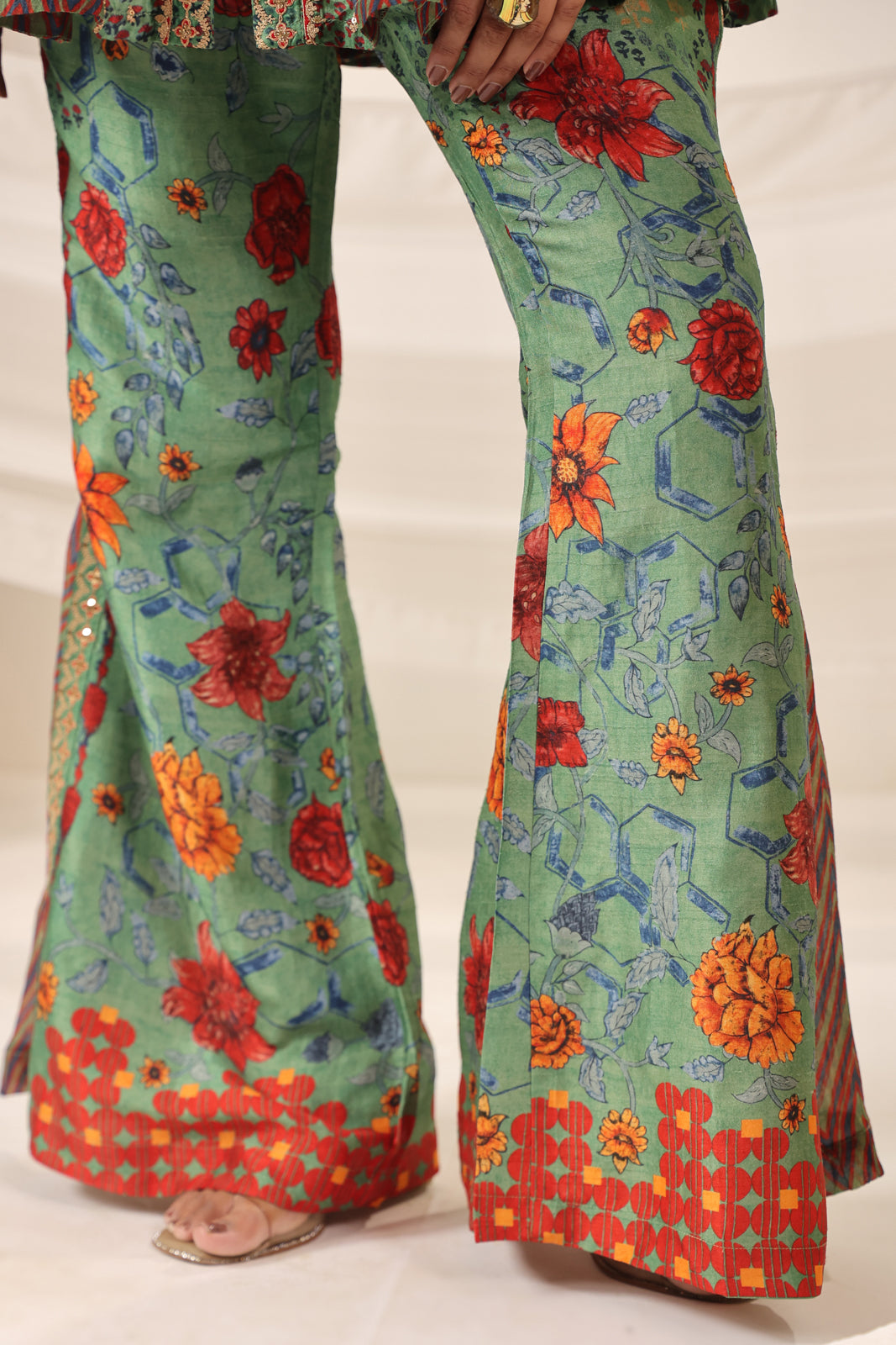 Green Satin Crepe Peplum Set With Intricate Prints & Embroidery- Wide Paired Palazzo Pant