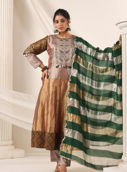 Golden Brown Tissue Silk Anarkali Salwar Suit With Rich Embroidery & Contrast Green Dupatta