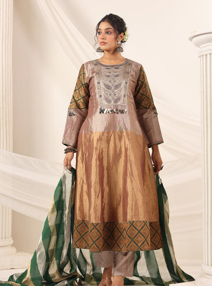 Golden Brown Tissue Silk Anarkali Salwar Suit With Rich Embroidery & Contrast Green Dupatta