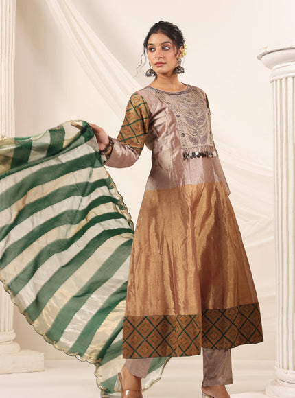 Golden Brown Tissue Silk Anarkali Salwar Suit With Rich Embroidery & Contrast Green Dupatta
