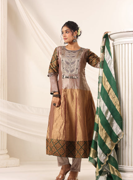 Golden Brown Tissue Silk Anarkali Salwar Suit With Rich Embroidery & Contrast Green Dupatta