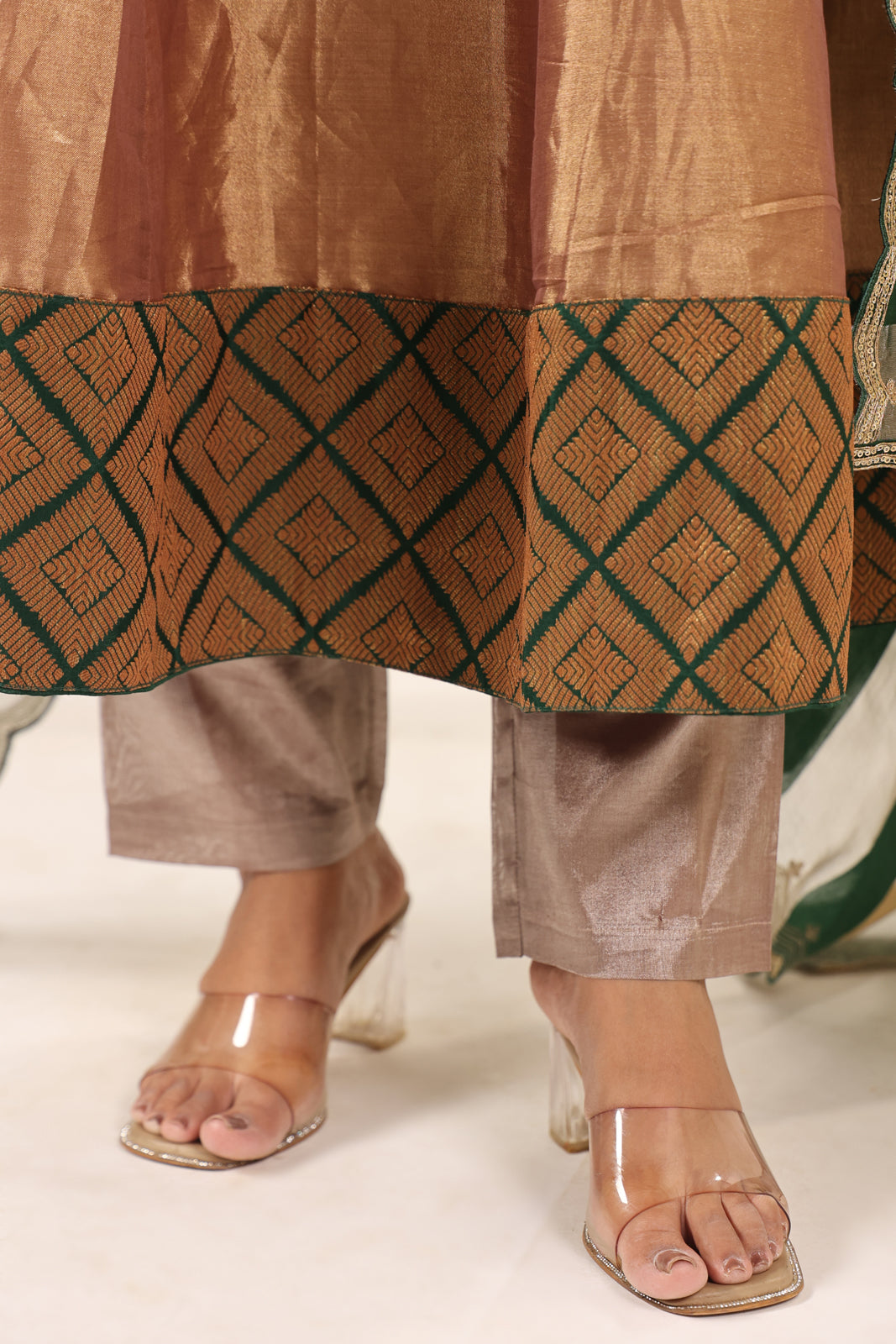Golden Brown Tissue Silk Anarkali Salwar Suit With Rich Embroidery & Contrast Green Dupatta