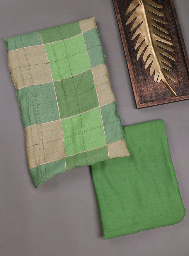 Green Tussar Embroidery Unstitched Suit