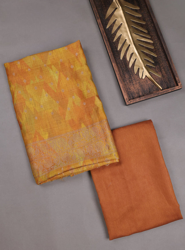 Dark Mustard Tussar Embroidery Unstitched Suit